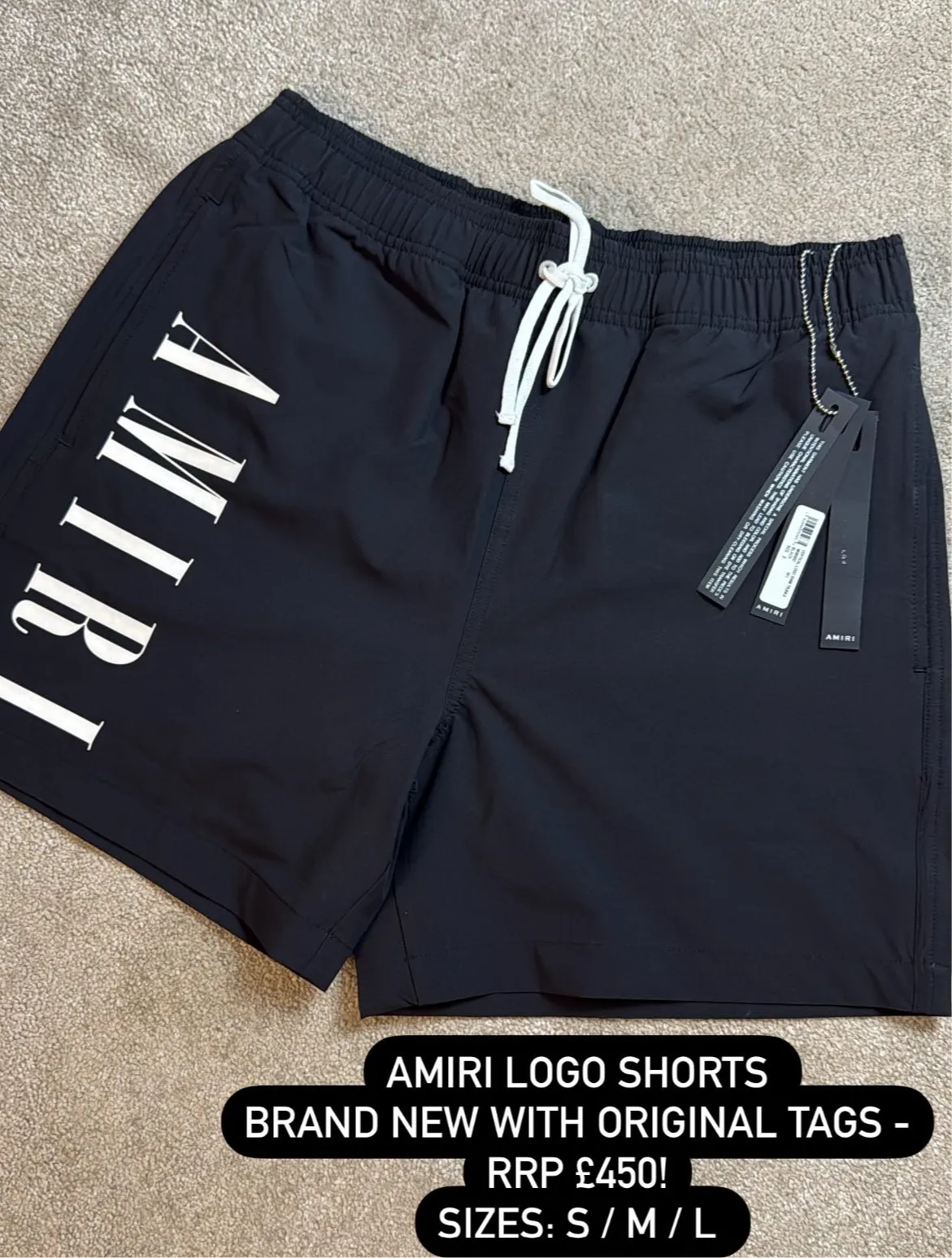 AMIRI VERTICAL LOGO SWIM SHORTS - BLACK