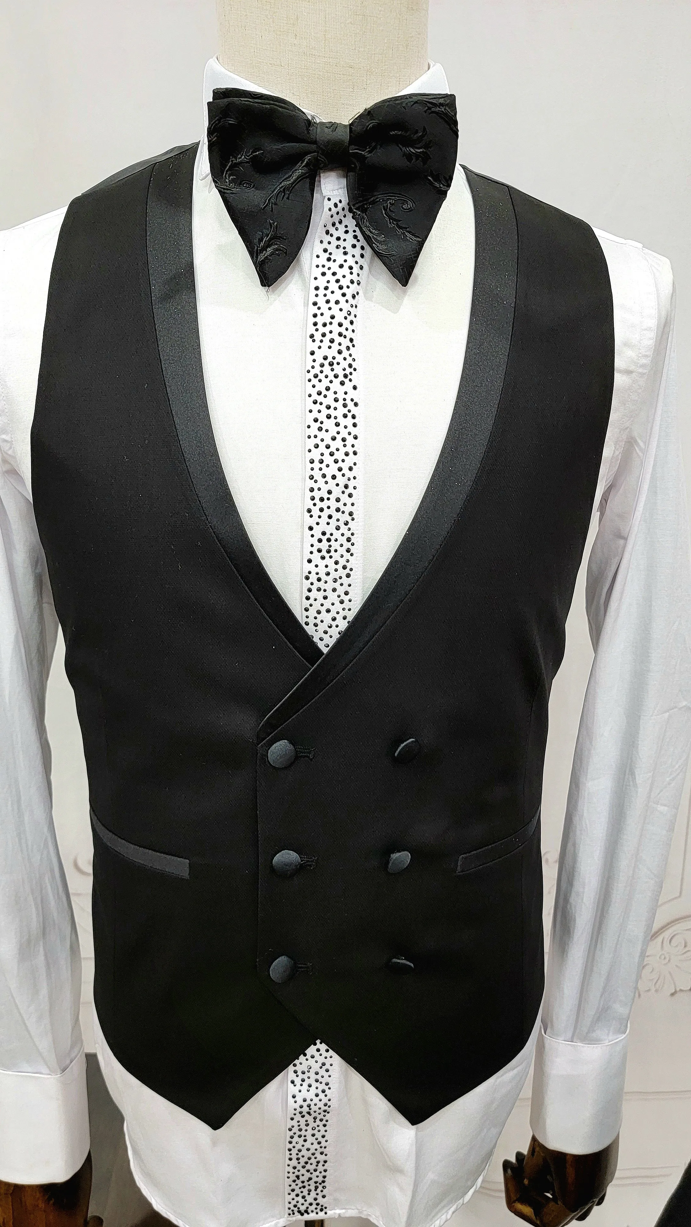 Three Piece Tuxedo suit with shiny lapel comes with matching bow tie.
